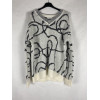 PULLOVER FANTASIA ASTRATTA