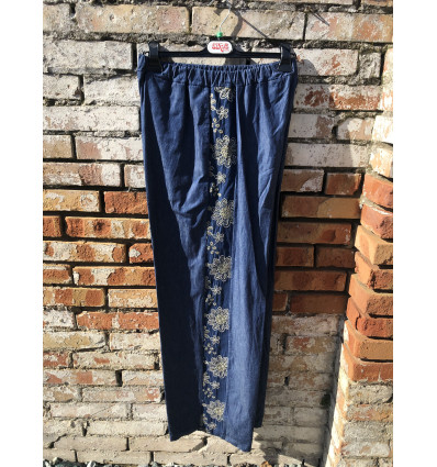 PANTALONE IN JEANS CON BANDA RICAMATA