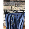 PANTALONE IN JEANS CON BANDA RICAMATA